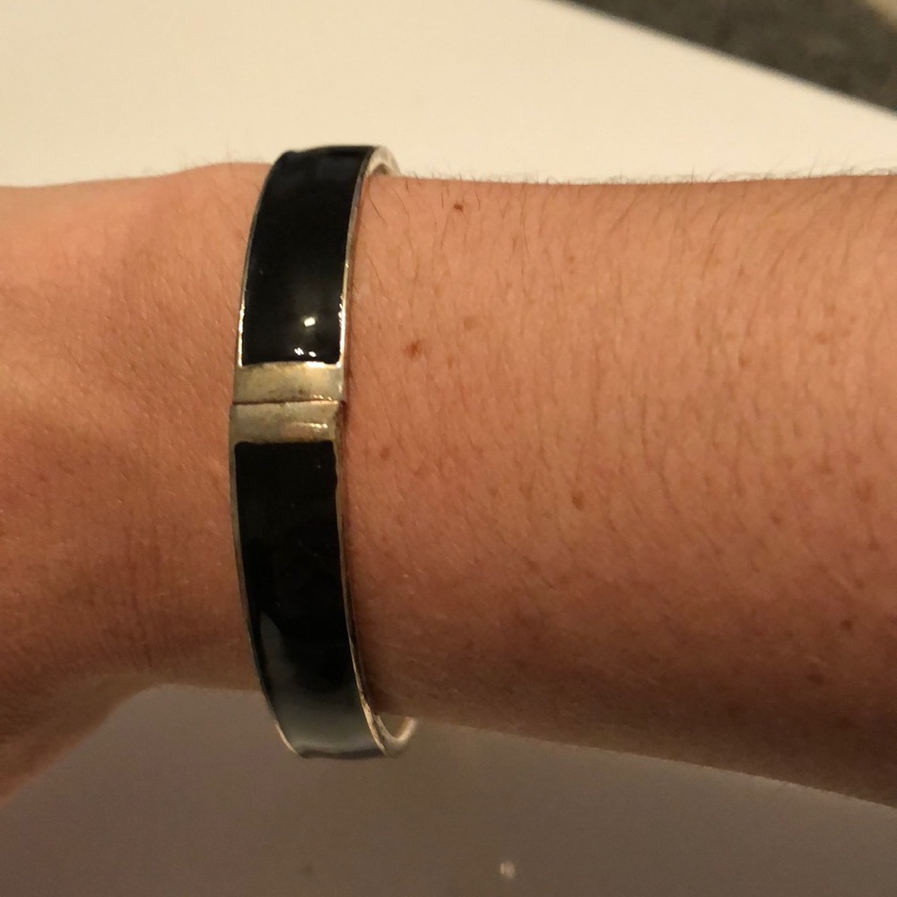 Black round bangle bracelet with silver accent